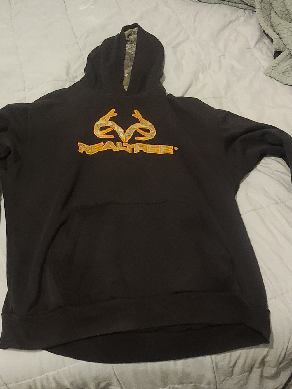 Realtree Black Hoodie with Orange Logo and Camo Hood Trim